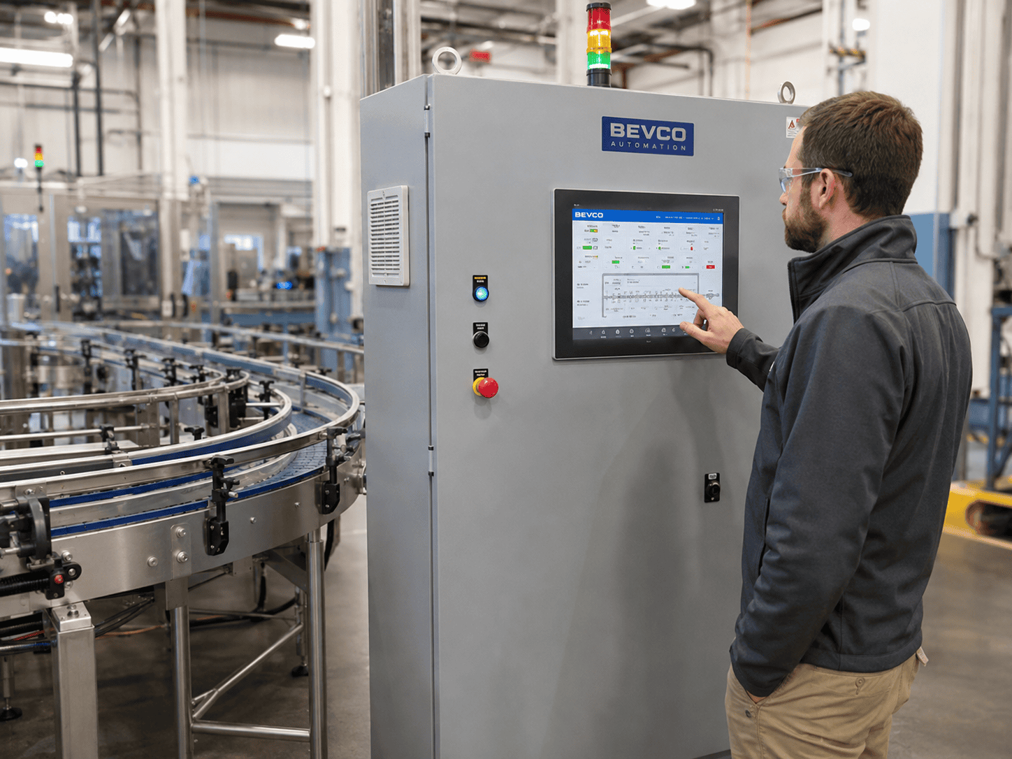 Man using an HMI on a control panel.
