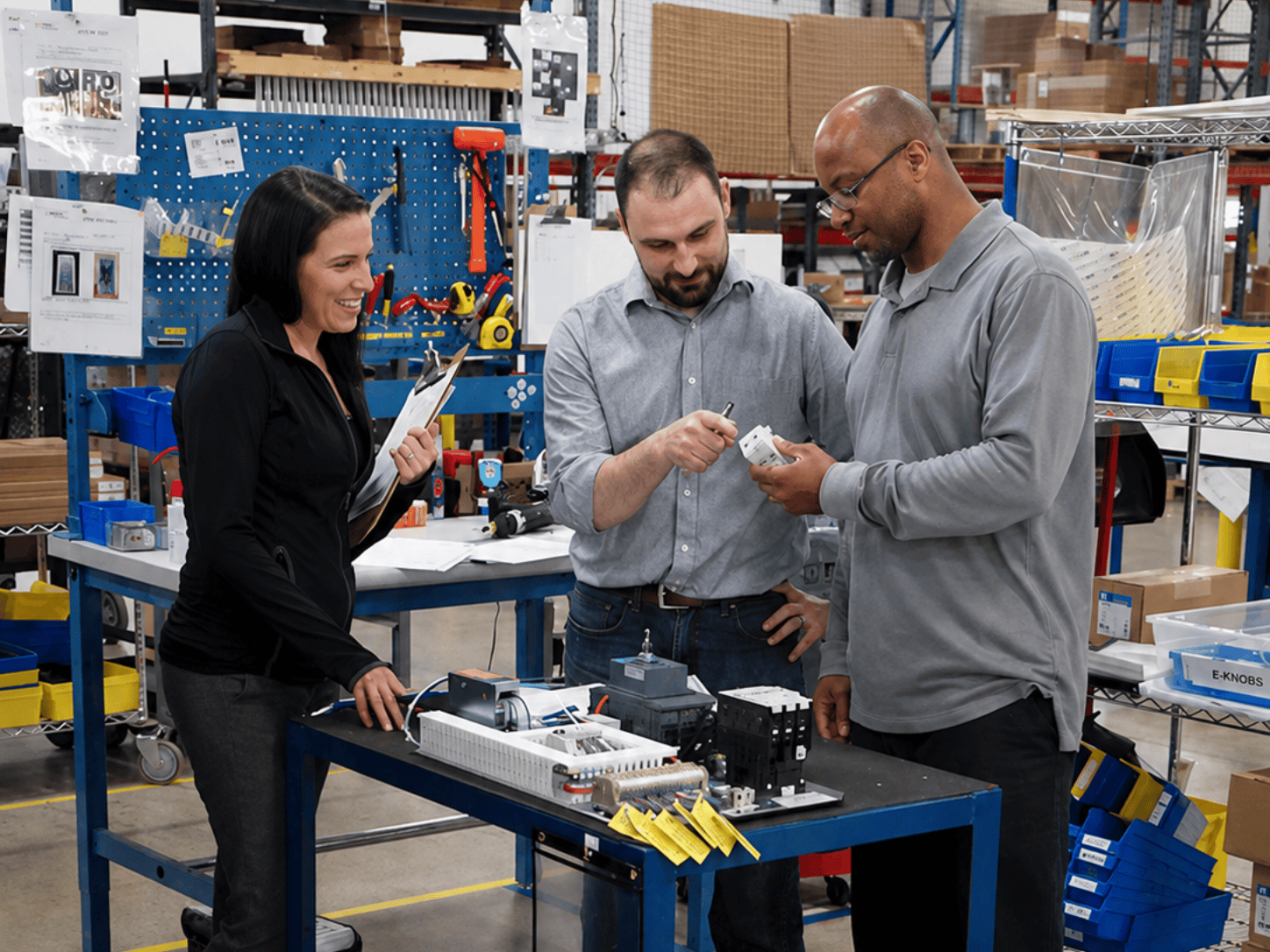 Bevco team working together while building a prototype.